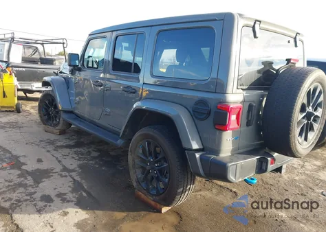 2022 Jeep Wrangler 4Xe Unlimited Sahara 4X4 z USA, uszkodzony, nr VIN 1C4JJXP63NW229250